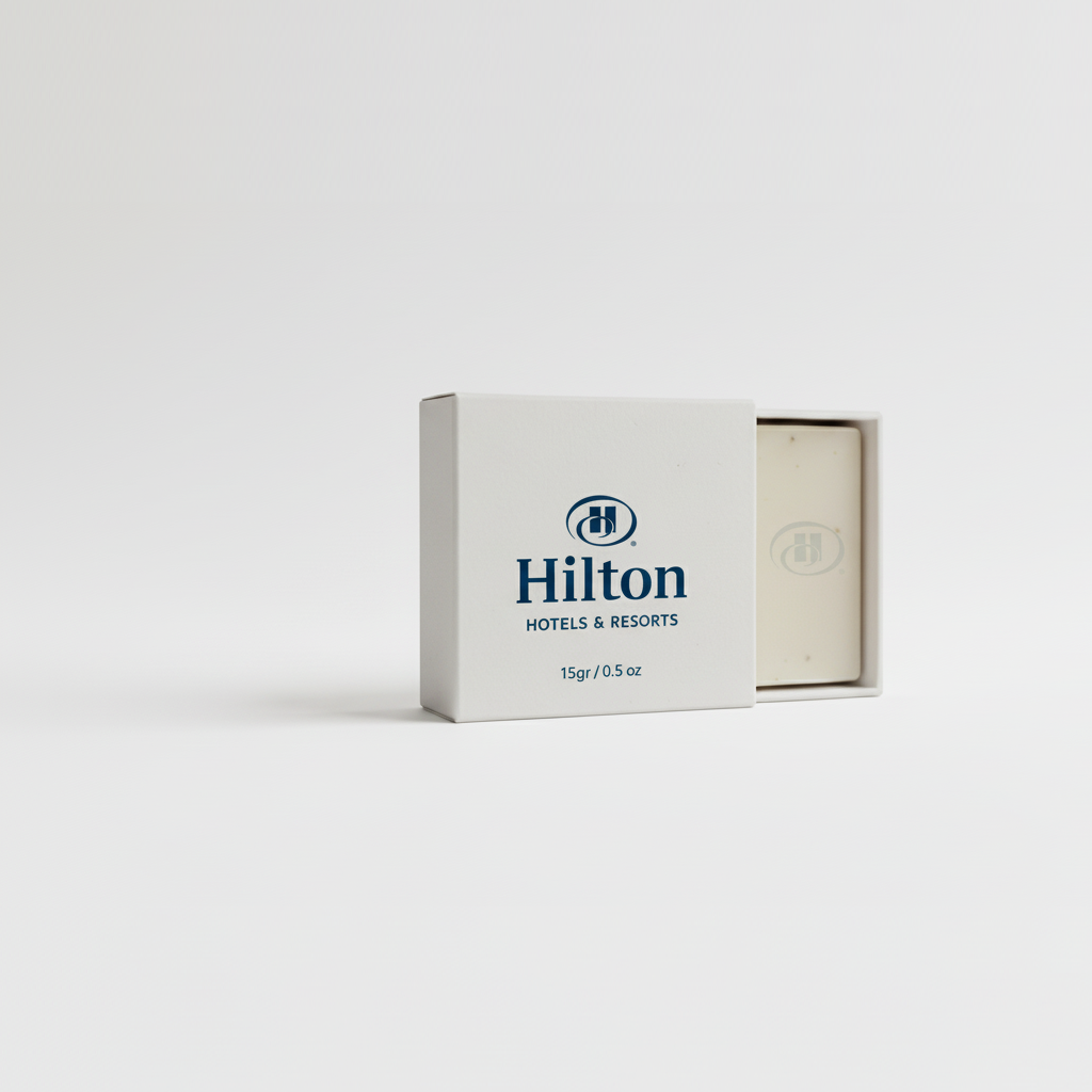 hilton-otel-sabunu Hilton Hotels markasına ait, 15 gramlık, beyaz kutu içinde sunulan otel sabunu.